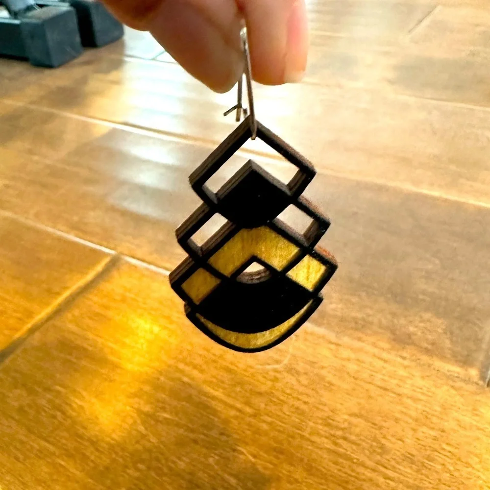 Laser cut geometric design black wood drop earrings
